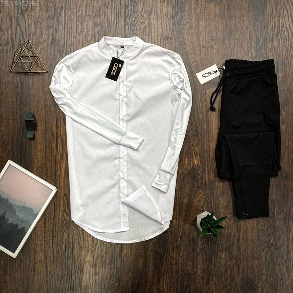 Стильний чоловічий костюм приталена біла сорочка чорні завужені штани